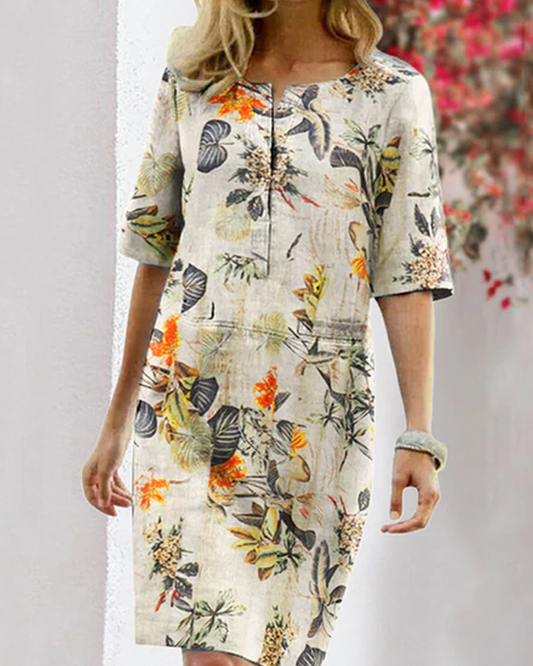 Imke| Vintage dress with floral print, round neckline and half sleeves